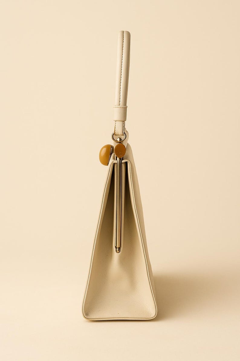 1960s Theodore of California Cream Faux Patent Leather Handbag Amber Frame Vintage Purse