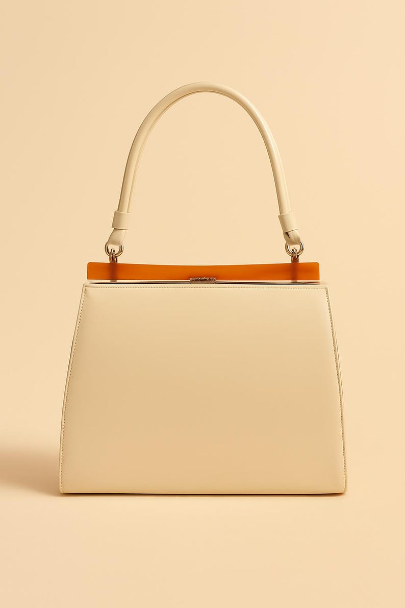 1960s Theodore of California Cream Faux Patent Leather Handbag Amber Frame Vintage Purse