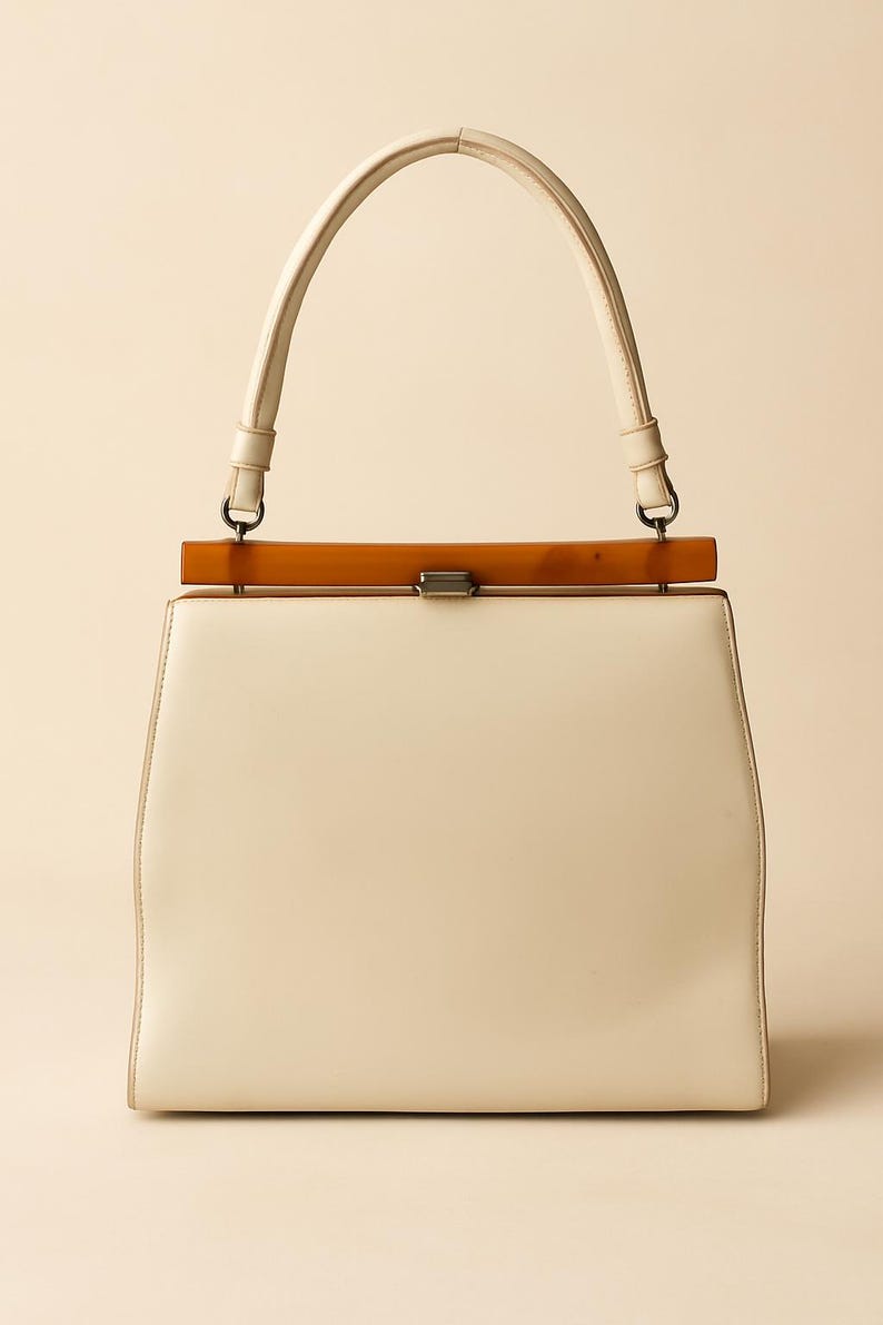 1960s Theodore of California Cream Faux Patent Leather Handbag Amber Frame Vintage Purse